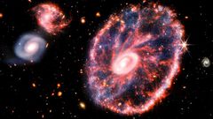 NASA difunde fotografía de la Galaxia Rueda d...